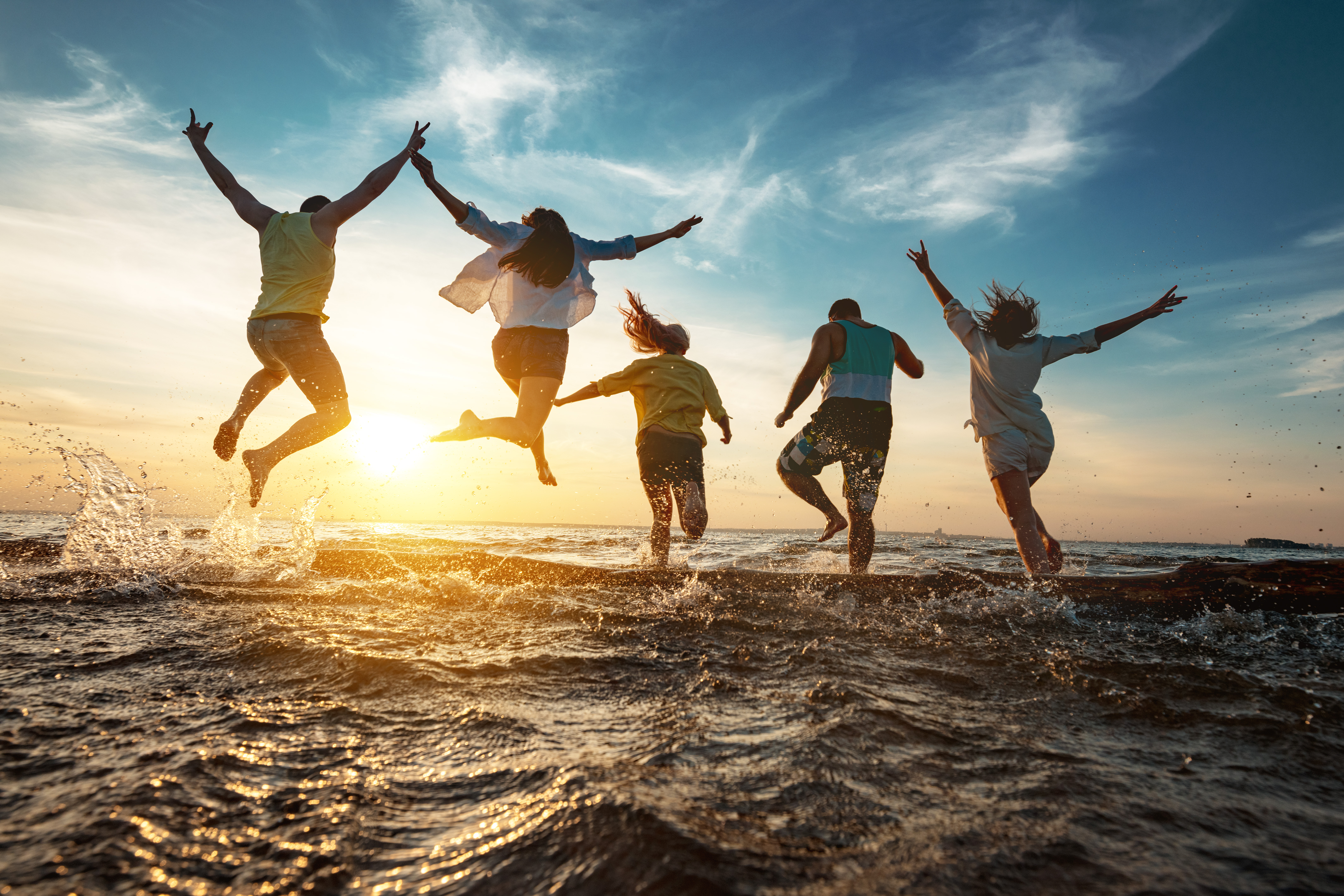 Group jumping in ocean.jpg