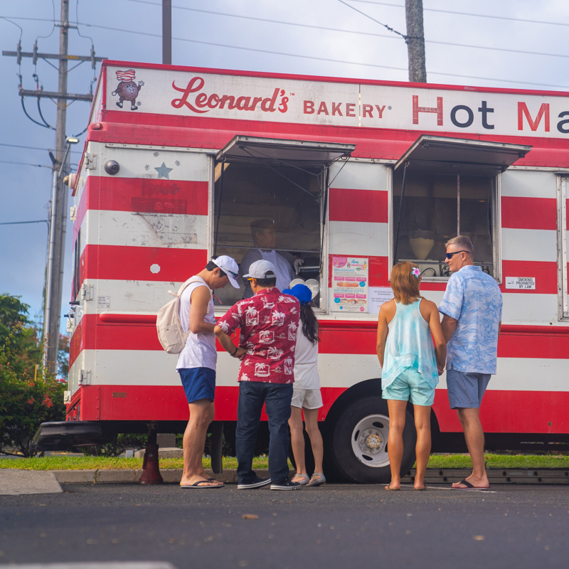 Leonard's Bakery Malasadas customers gathered outside the famous Leonard's Bakery Malasada Mobile food truck